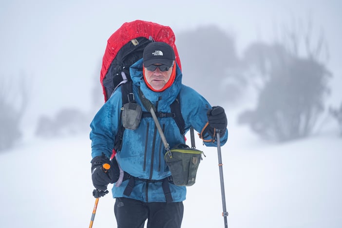 22 Huw on the Bogong High Plains near Falls Creek on a windswept day. Credit Mark Watson