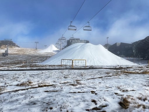 Snow piles growing on Bourke Street to guarantee skiing from opening weekend