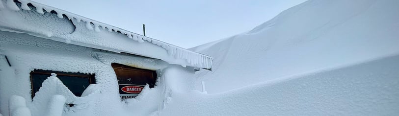 Summit hut storm loaded